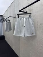 MIUMIU embroidered and labeled fringed shorts