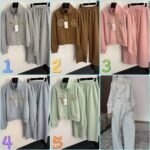 Schiaparelli’s new tracksuit with gold button embellishments