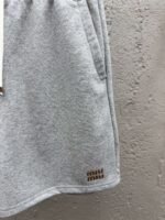 MIUMIU embroidered and labeled fringed shorts - Image 7