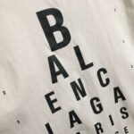 Balenciaga distressed-style T-shirt with eye chart letter print and loose fit. - Image 7
