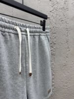 MIUMIU embroidered and labeled fringed shorts - Image 8