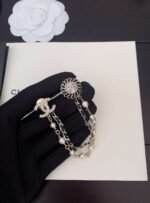 Chanel New Round Pearl Black Leather Double Brooch - Image 4