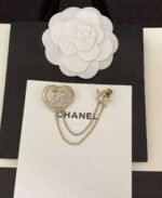 Chanel’s latest hollow heart double chain brooch