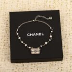 Chanel Black lace bag necklace