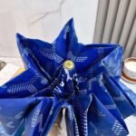 Goyard tri-fold sun-protective umbrella has a black inner coating that effectively blocks 99% of UV rays. - Image 7