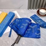 Goyard tri-fold sun-protective umbrella has a black inner coating that effectively blocks 99% of UV rays. - Image 6