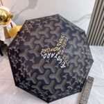 Goyard tri-fold sun-protective umbrella has a black inner coating that effectively blocks 99% of UV rays. - Image 4