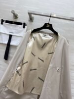 Chanel vintage series workwear mid-length trench coat with lettering printed lining and imported trench coat fabric - Image 8