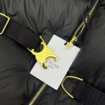 Celine’s new stand-collar zip-up down jacket, featuring a custom-designed Arc de Triomphe metal elastic belt, is filled with 90% white goose down. High-quality down jackets - Image 7