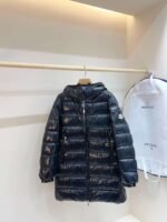 MONCLER’s latest winter collection: Women’s mid-length hooded down jacket. - Image 9