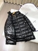 MONCLER’s latest winter collection: Women’s mid-length hooded down jacket. - Image 8