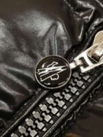 MONCLER’s latest winter collection: Women’s mid-length hooded down jacket. - Image 7