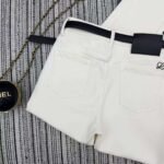 Loewe’s new cropped denim trousers featuring embroidered logo detailing and a fleece lining for warmth. - Image 9