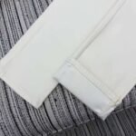 Loewe’s new cropped denim trousers featuring embroidered logo detailing and a fleece lining for warmth. - Image 7