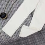 Loewe’s new cropped denim trousers featuring embroidered logo detailing and a fleece lining for warmth. - Image 4