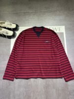 PRADA’s new cotton striped long-sleeved T-shirt is made of soft cotton jersey fabric. - Image 7