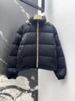 Burberry Autumn/Winter New Collection: Stand-collar hooded checked down jacket. - Image 10