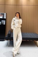 Celine collared sweatshirt and wide-leg pants set with elastic waistband.