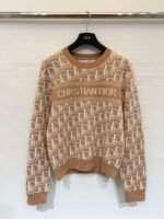 DIOR Autumn/Winter New Collection: Monogram round-neck knitted long-sleeved top with gold thread monogram logo design. - Image 9