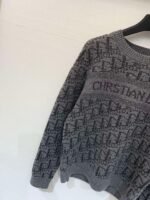 DIOR Autumn/Winter New Collection: Monogram round-neck knitted long-sleeved top with gold thread monogram logo design. - Image 6