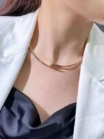 Cartier Nail Collar, high-end version with diamonds at both ends.