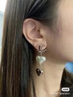 Chanel light gold heart heart earrings - Image 5