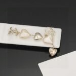 Chanel light gold heart heart earrings - Image 3