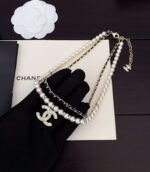 Chanel black leather pearl double necklace