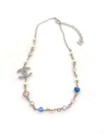 A white gold, blue and pink heart-shaped necklace - Image 6