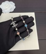 A white gold, blue and pink heart-shaped necklace - Image 4