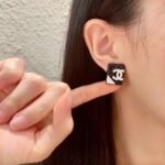 Chanel diamond-shaped double C stud earrings