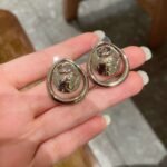 Chanel double C stud earrings - Image 7