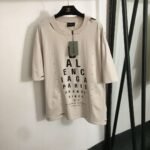 Balenciaga distressed-style T-shirt with eye chart letter print and loose fit.