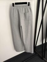 Schiaparelli’s new tracksuit with gold button embellishments - Image 13