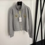 Schiaparelli’s new tracksuit with gold button embellishments - Image 11