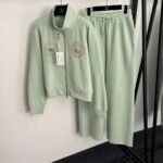 Schiaparelli’s new tracksuit with gold button embellishments - Image 7
