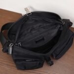 PRADA The new messenger bag features a flap design and adjustable shoulder strap. SIZE:27x18x7cm - Image 6