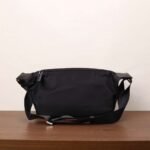 PRADA The new messenger bag features a flap design and adjustable shoulder strap. SIZE:27x18x7cm - Image 2