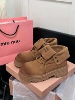MIUMIU Martin boots
