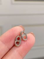 Hermès pig nose earrings